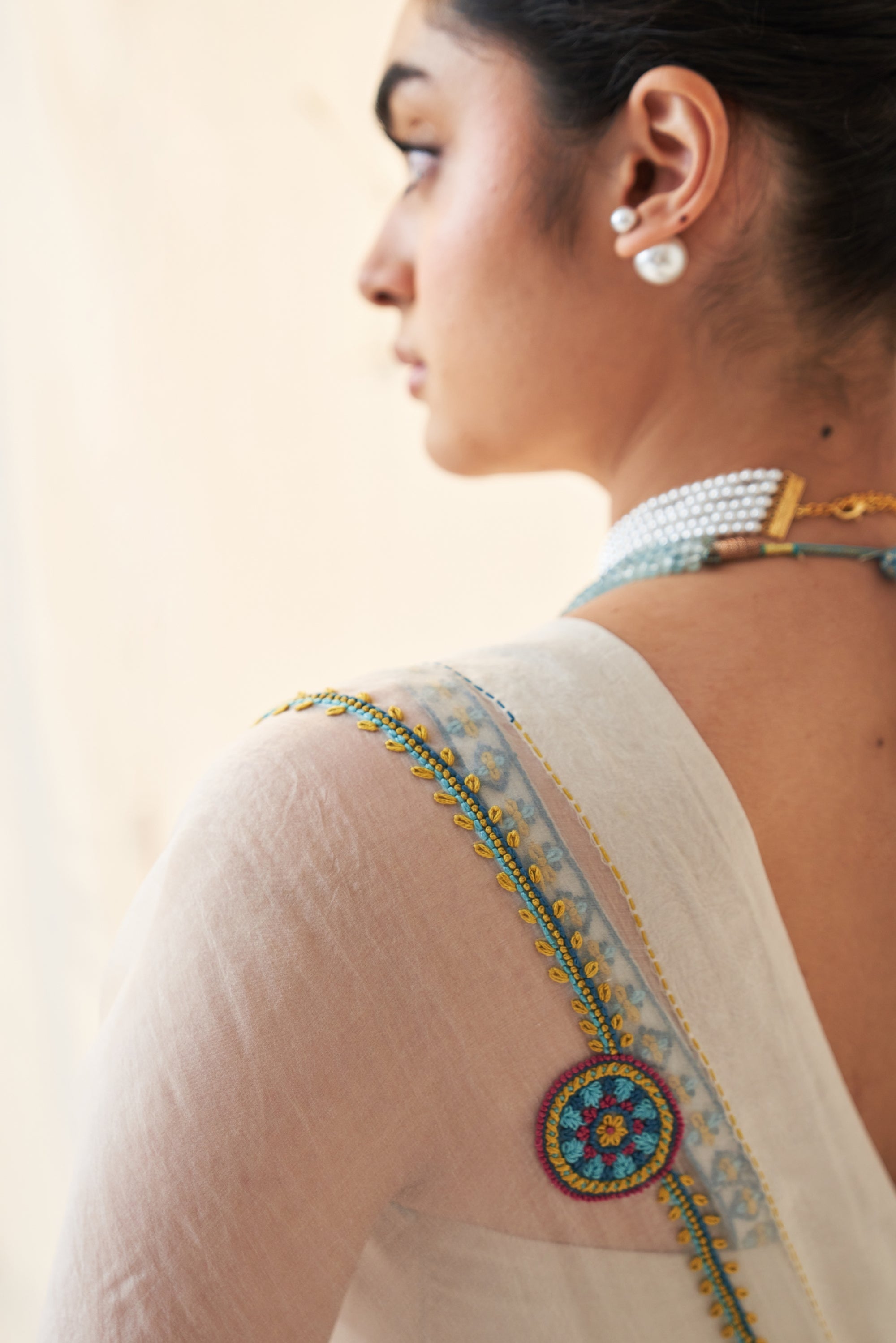 Ivory Organza Saree And Chanderi Blouse With Multicolour Thread Handwork