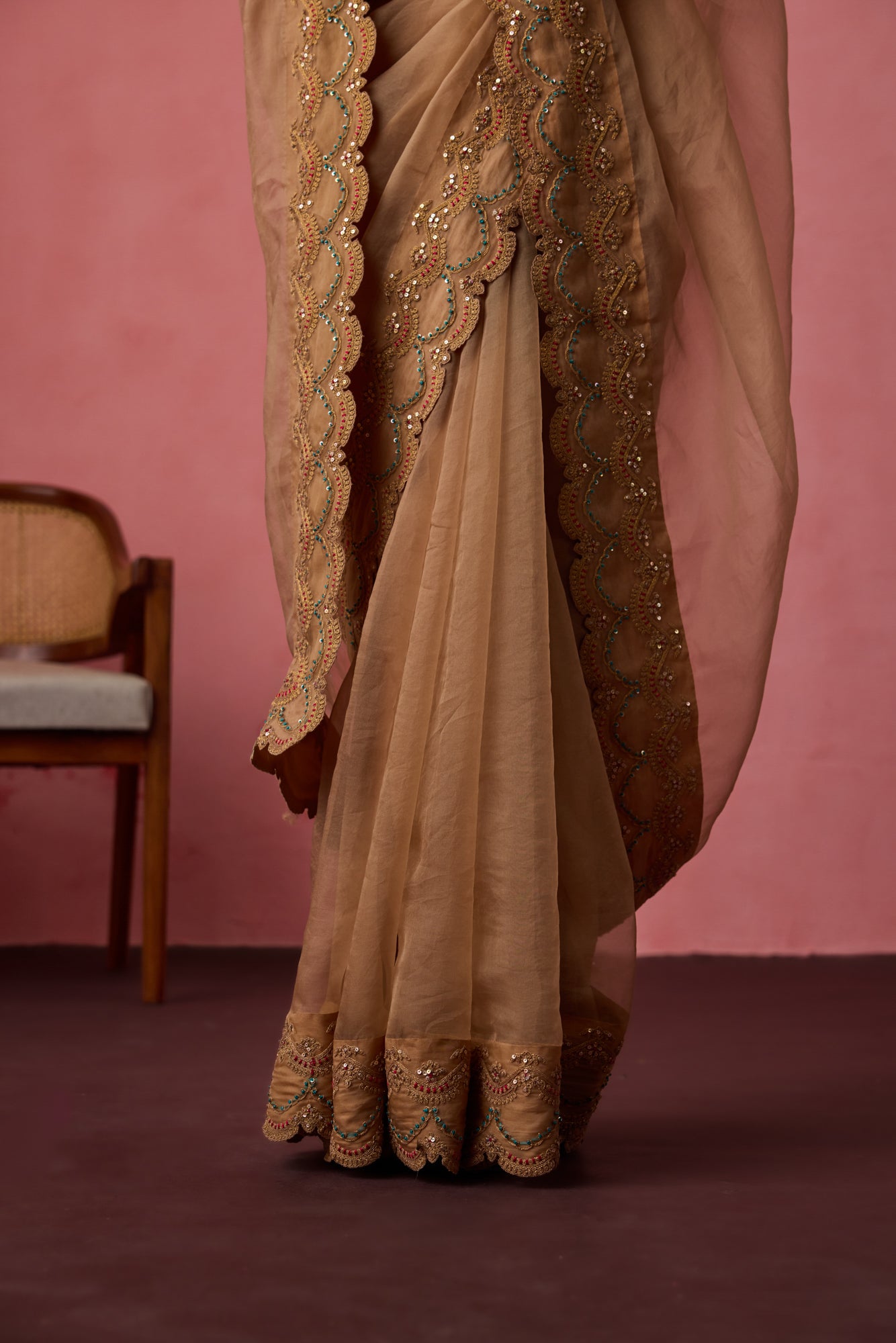 Golden organza dori & resham embroidered saree paired with unstitched & unembroidered blouse fabric