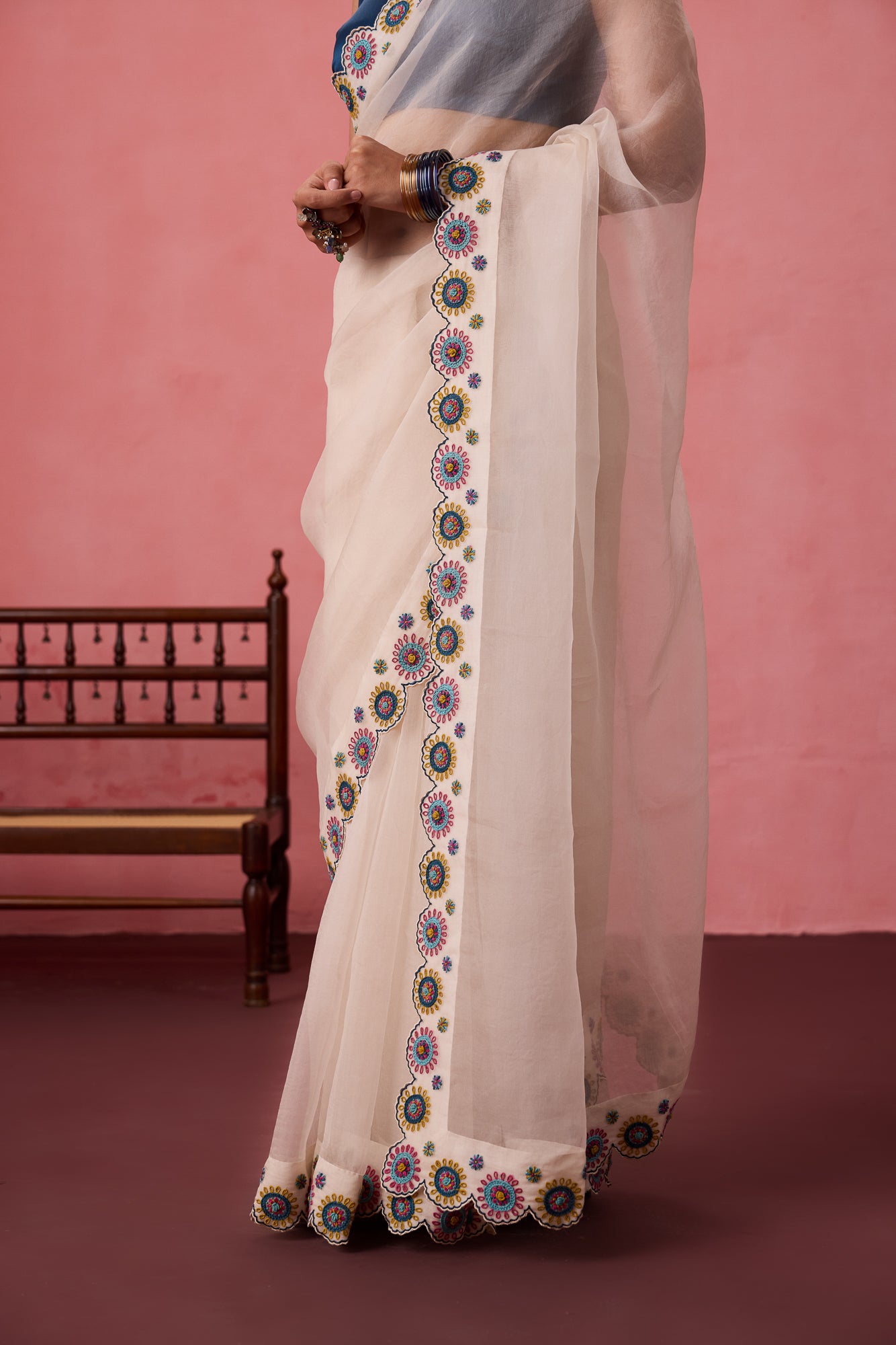 Ivory organza heavy scalloped cutwork embroidered saree comes with unstitched & unembroidered blouse fabric in chanderi