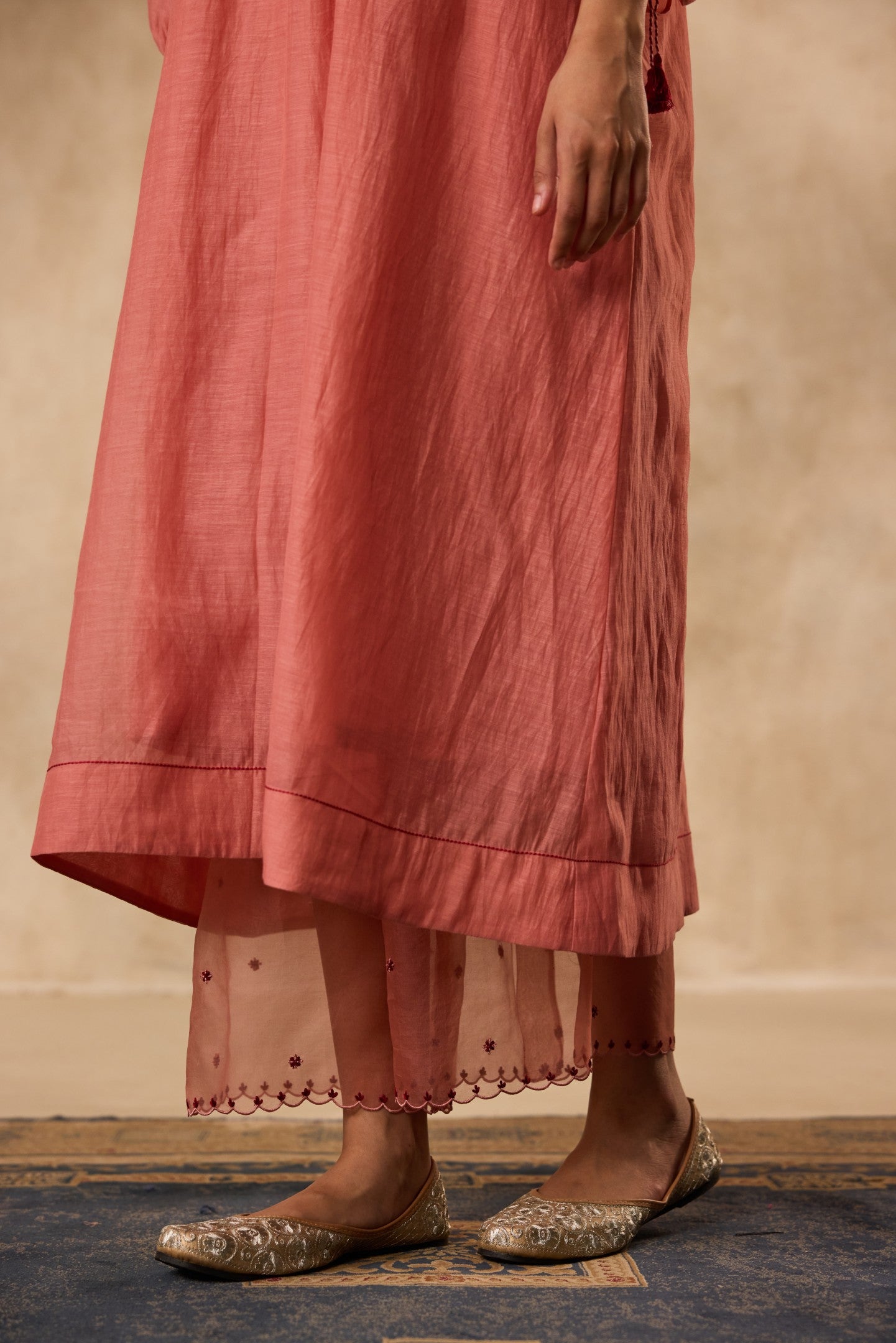 PEACH CHANDERI CROSS STICH EMBROIDERED TUNIC PAIRED WITH ORGANIC COTTON SLIP & MATCHING PANT & ORGANZA DUPATTA