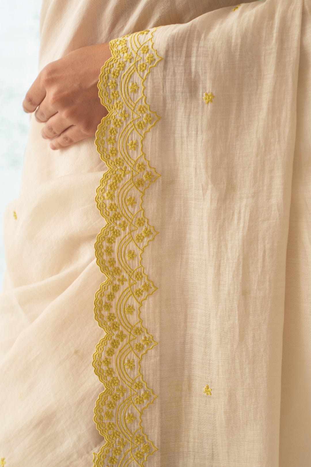 Ivory Chanderi Saree Set with Yellow Scallop Border, Stitched Blouse, and Organic Cotton Petticoat – A Classic Choice in Chanderi Sarees