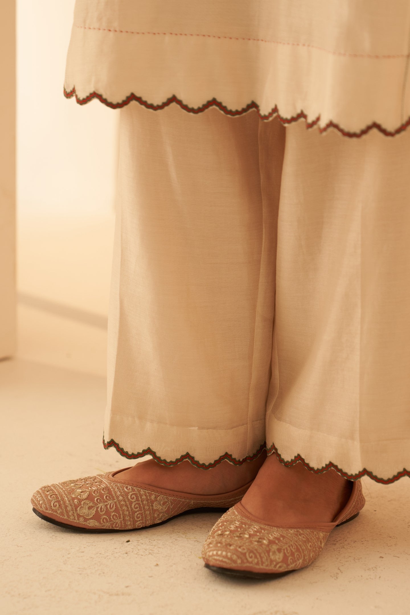 Ivory Chanderi kurta paired with cotton slip, salwar & organza dupatta