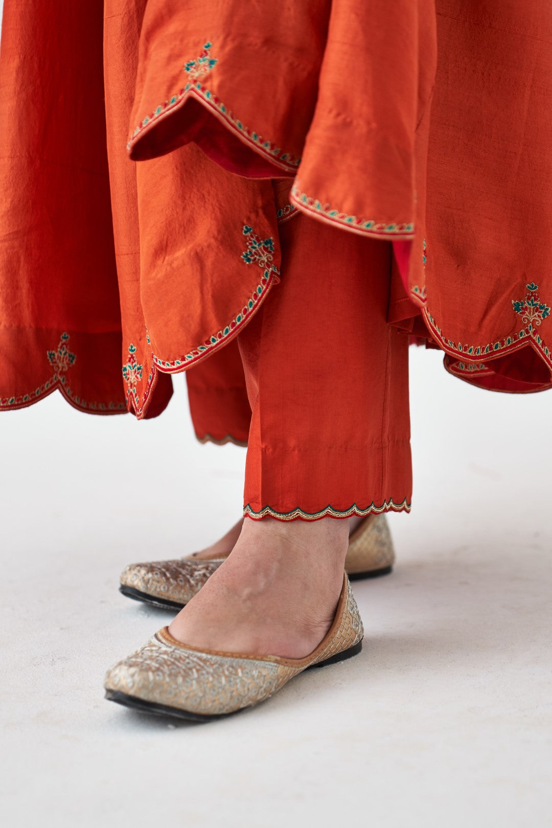 Rust Cotton Silk Embroidered Anarkali paired with pant and organza dupatta (03 Pcs.)