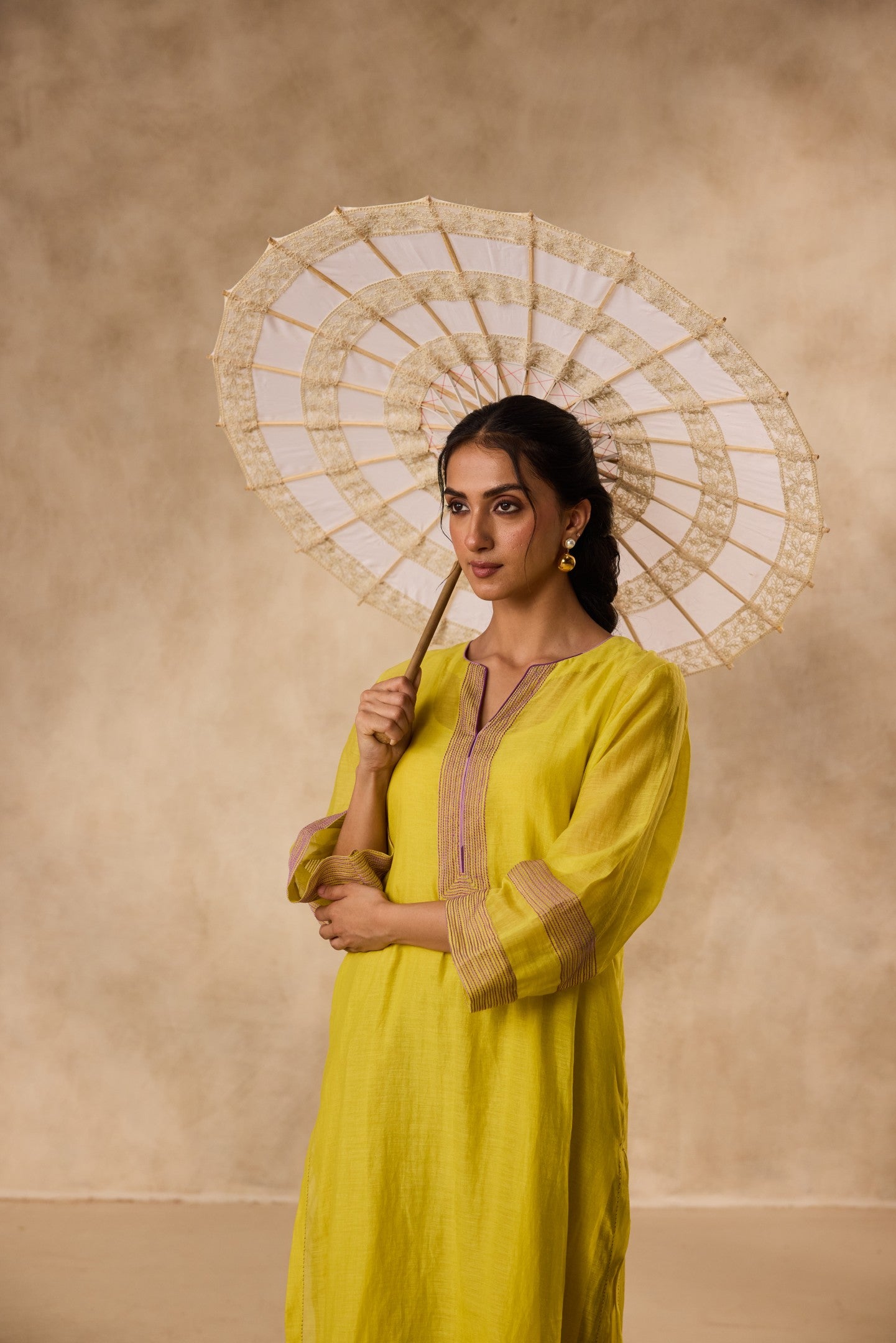 Lime yellow & Purple chanderi resham embroidered tunic paired with organic cotton slip and pant