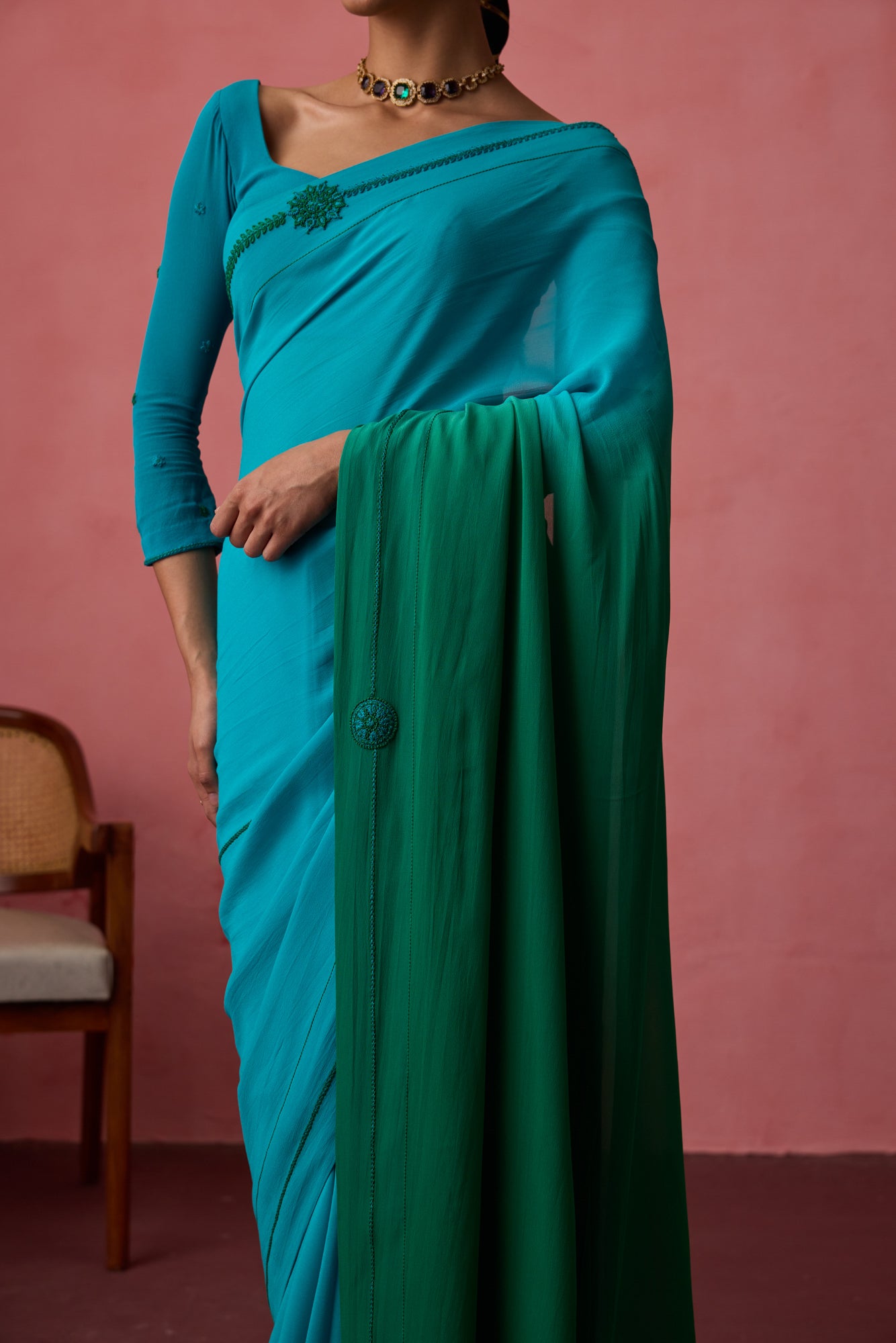 Turquoise ombre georgette embroidered saree paired with unstitched & unembroidered blouse fabric