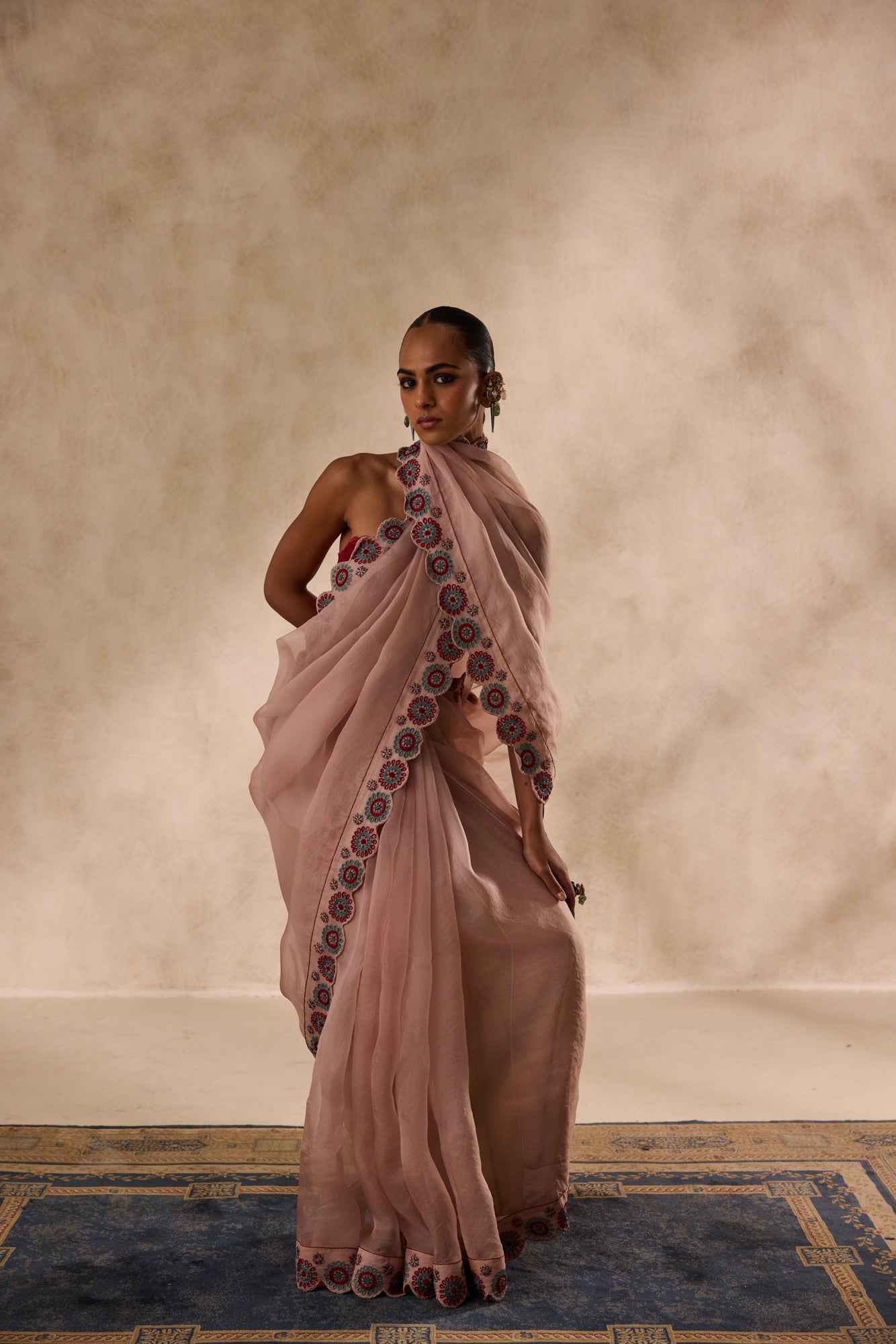Rose gold organza heavy cutwork border embroidered saree comes with unstitched & unembroidered blouse fabric in chanderi