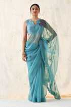 Teal Organza Saree with blouse fabric (Chanderi Stitched Blouse seperately priced at 7000/- Rupees)