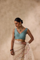 Sky blue chanderi scallocp stitched blouse