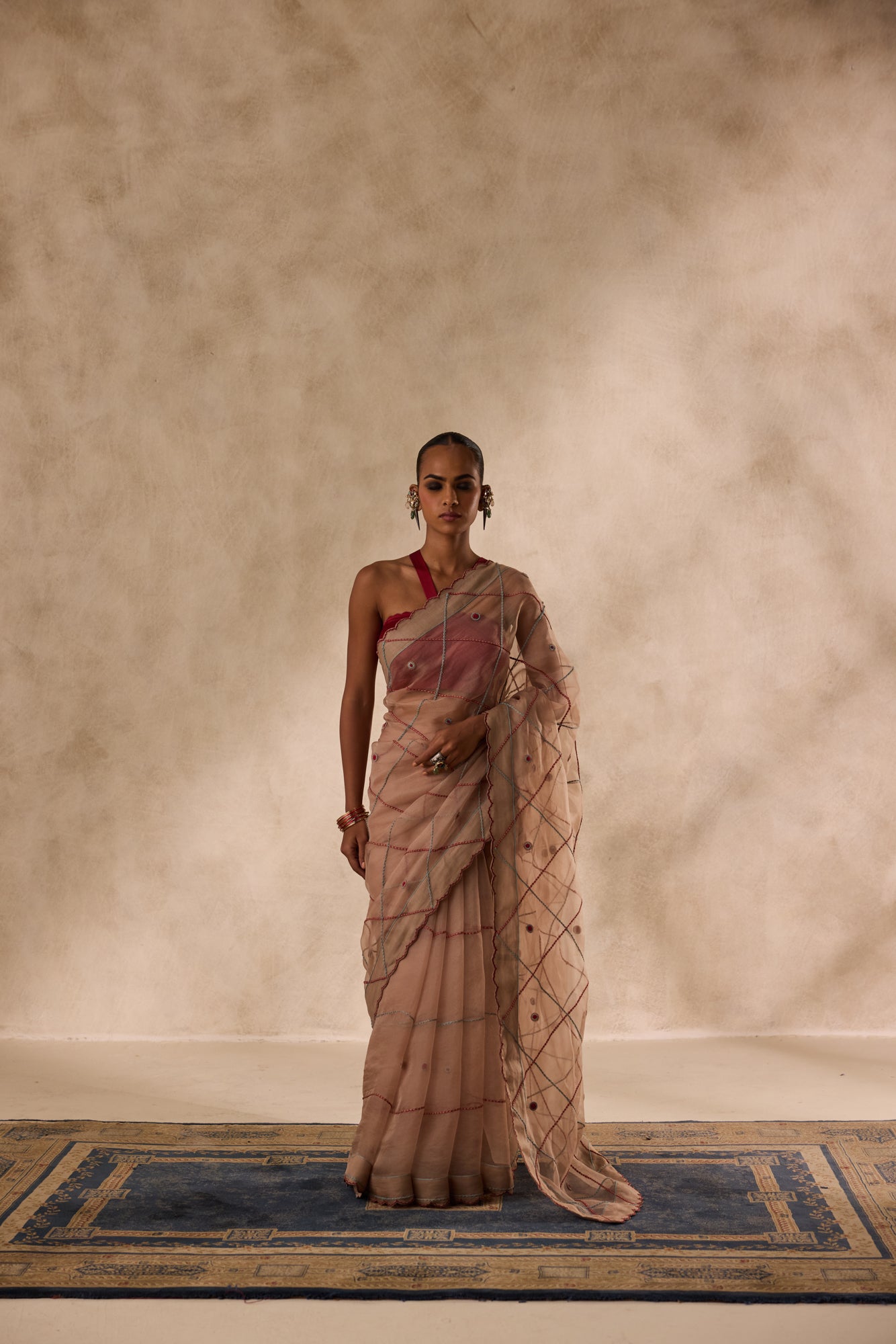 Beige organza jaal embroidered saree comes with unstitched & unembroidered blouse fabric in chanderi