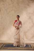Ivory organza french knot jaal & paisley work saree comes with unstitched & unembroidered blouse fabric in chanderi