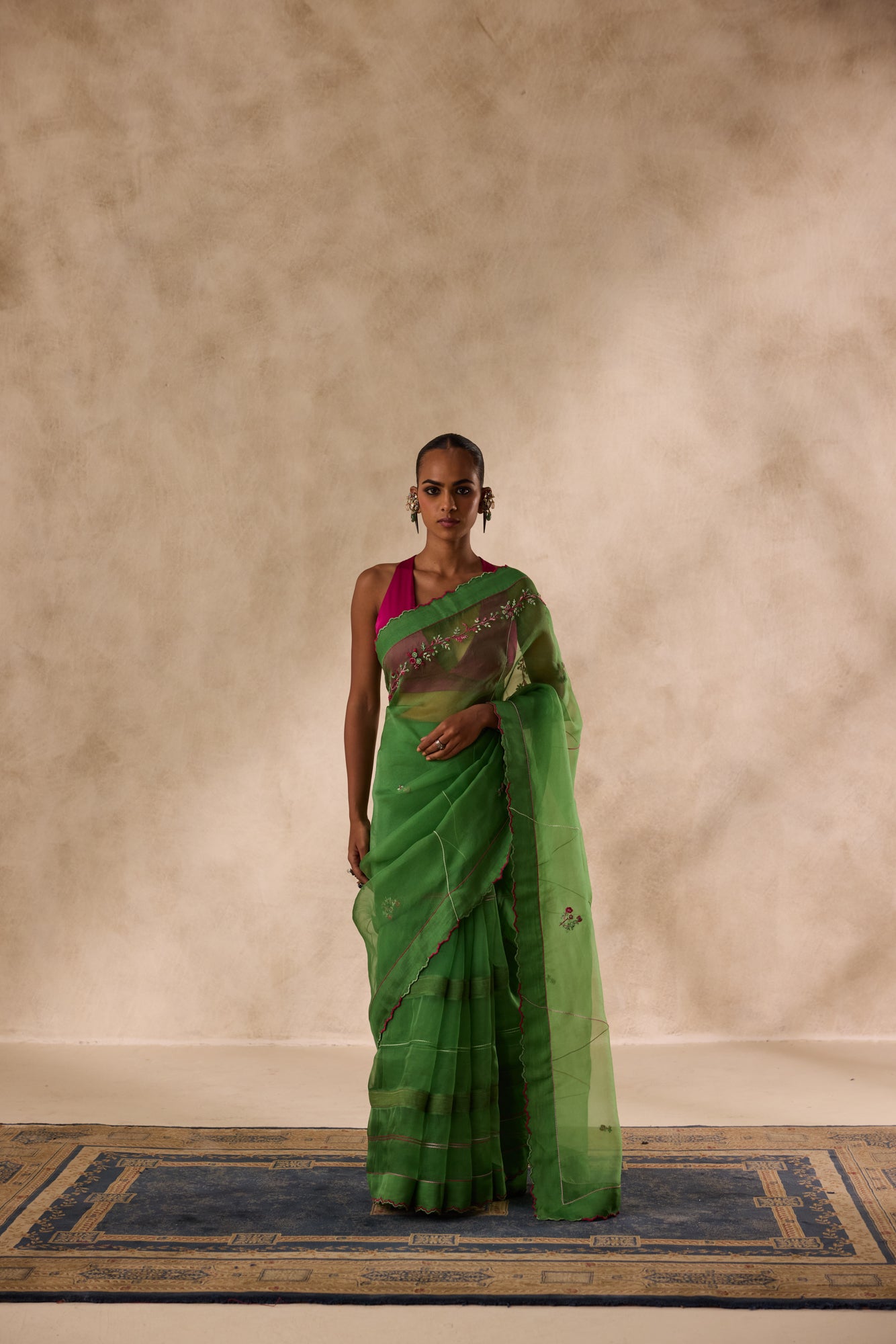 Green organza embroidered saree comes with unstitched & unembroidered blouse fabric in chanderi