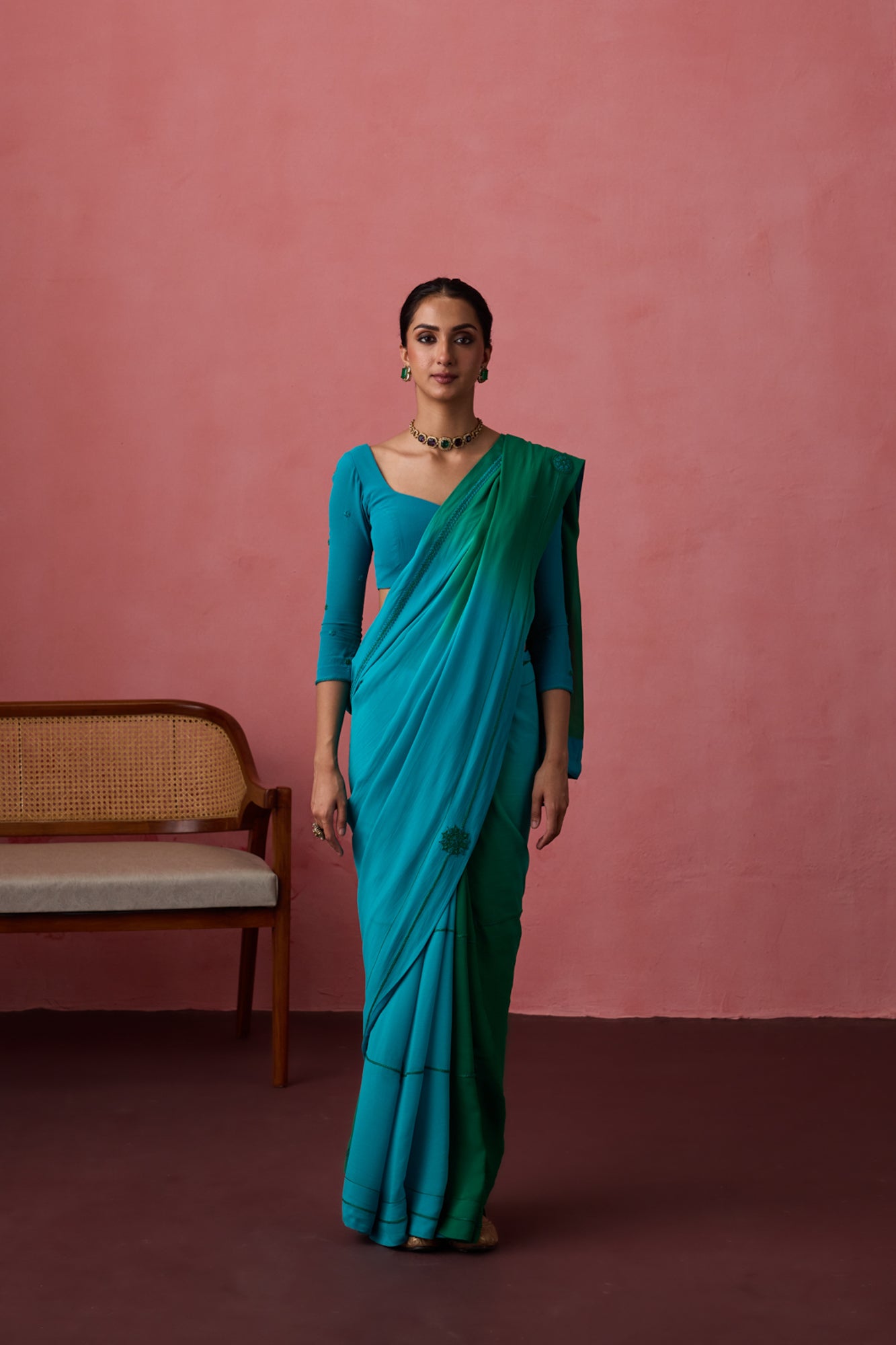 Turquoise ombre georgette embroidered saree paired with unstitched & unembroidered blouse fabric