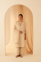 Ivory Chanderi kurta paired with cotton slip, salwar & organza dupatta