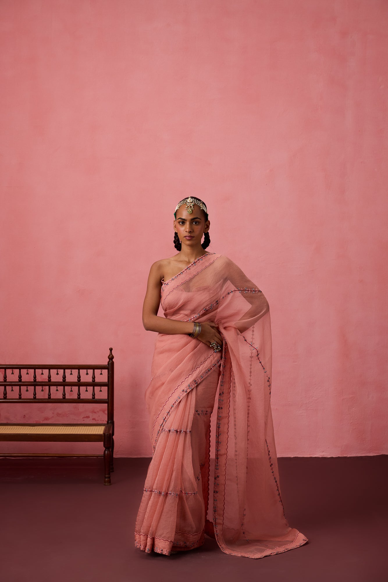 Peach organza embroidered saree comes with unstitched & unembroidered blouse fabric in chanderi