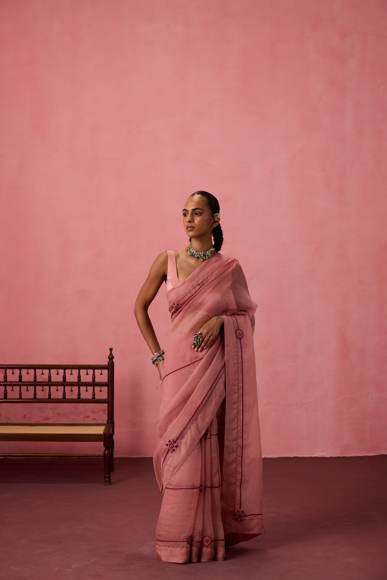 Peach organza embroidered saree comes with unstitched & unembroidered blouse fabric in chanderi