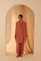 Peach Chanderi resham buti embroidered kurta paired with cotton slip & Salwar