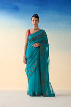 Turquoise silk multicolor embroidered & scallop work saree paired with blouse fabric