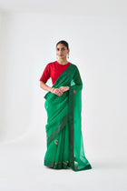 Lime green silk jaal embroidered saree