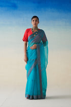 Turquoise  organza  embroidered saree