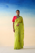 Lime green silk jaal embroidered saree