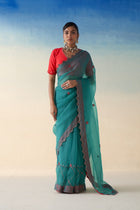 Turquoise organza checkered jaal-embroidered saree