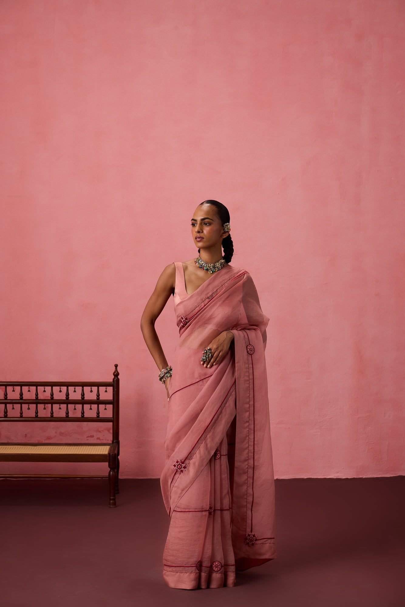 Peach organza embroidered saree comes with unstitched & unembroidered blouse fabric in chanderi