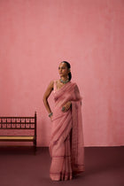 Peach organza embroidered saree comes with unstitched & unembroidered blouse fabric in chanderi