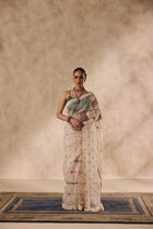 Ivory organza resham and thread embroidered saree comes with unstitched & unembroidered blouse fabric in chanderi