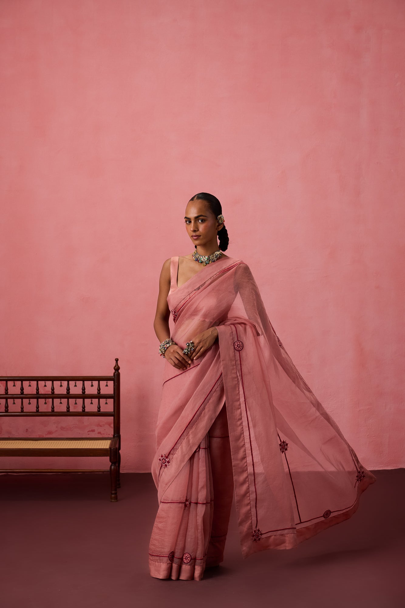 Peach organza embroidered saree comes with unstitched & unembroidered blouse fabric in chanderi