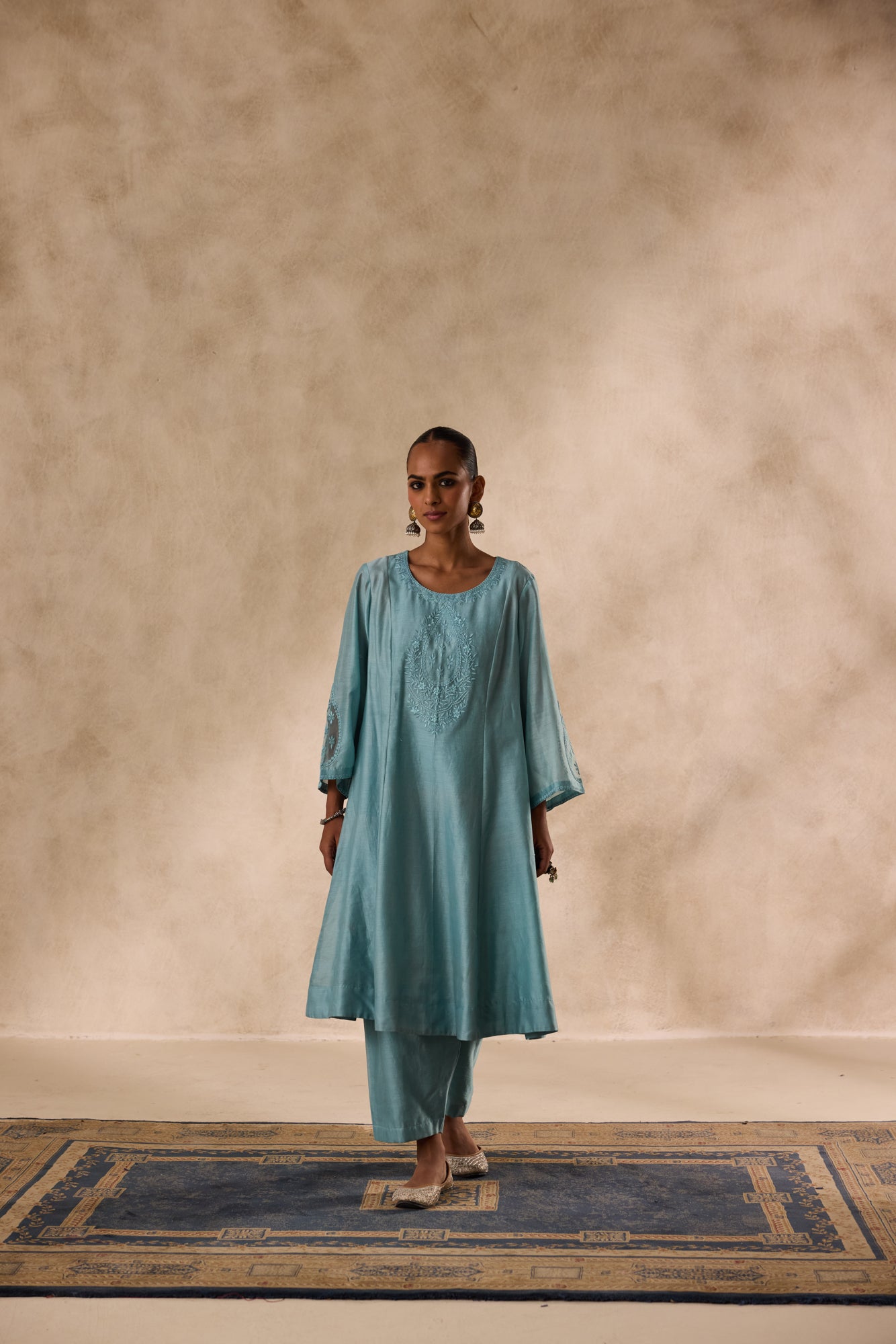 Sky blue chanderi floral resham embroidered kurta paired with organic cotton slip, pant & organza dupatta