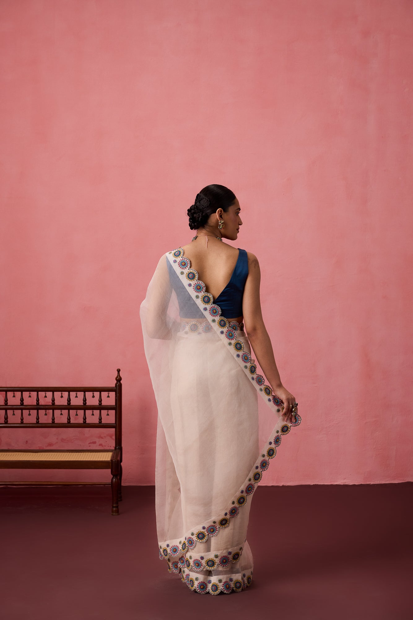 Ivory organza heavy scalloped cutwork embroidered saree comes with unstitched & unembroidered blouse fabric in chanderi