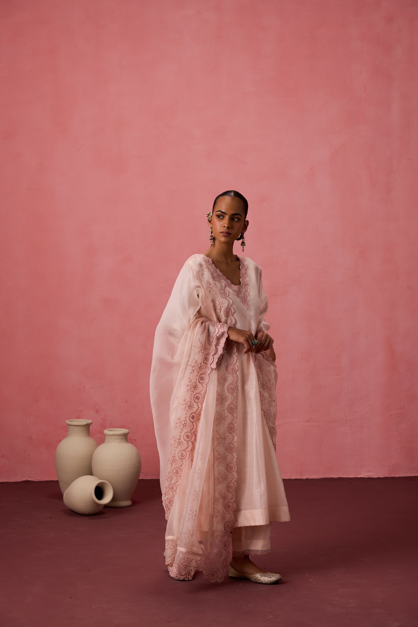 Cozy peach chanderi floral resham embroidered kurta paired with organic cotton slip, pant & organza dupatta