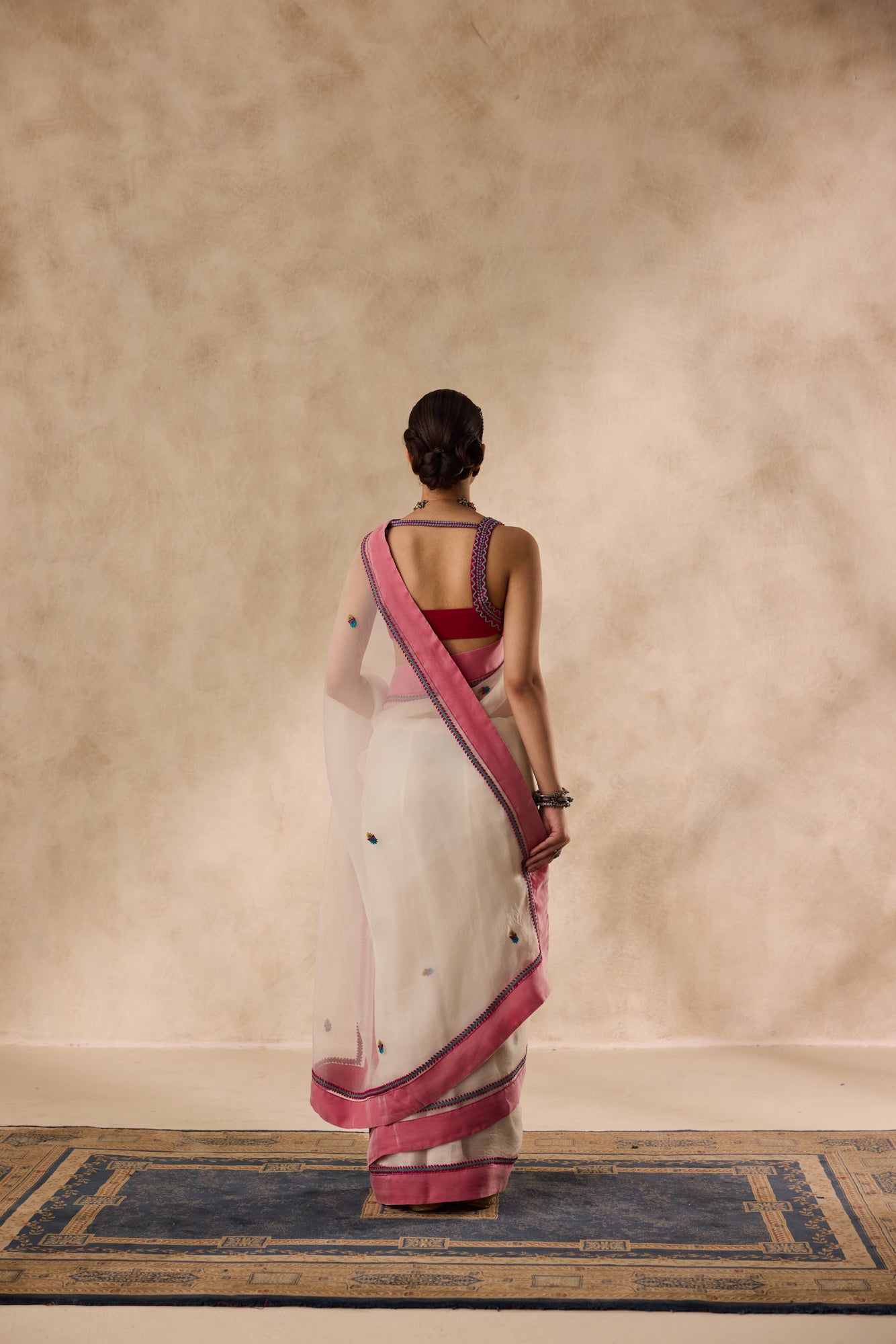 Ivory organza rasham buti embroidered saree comes with unstitched & unembroidered blouse fabric in chanderi