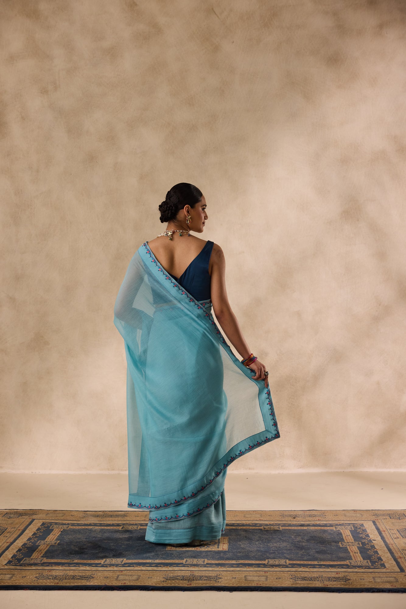 Sky blue chanderi scalloped embroidered saree comes with unstitched & unembroidered blouse fabric in chanderi