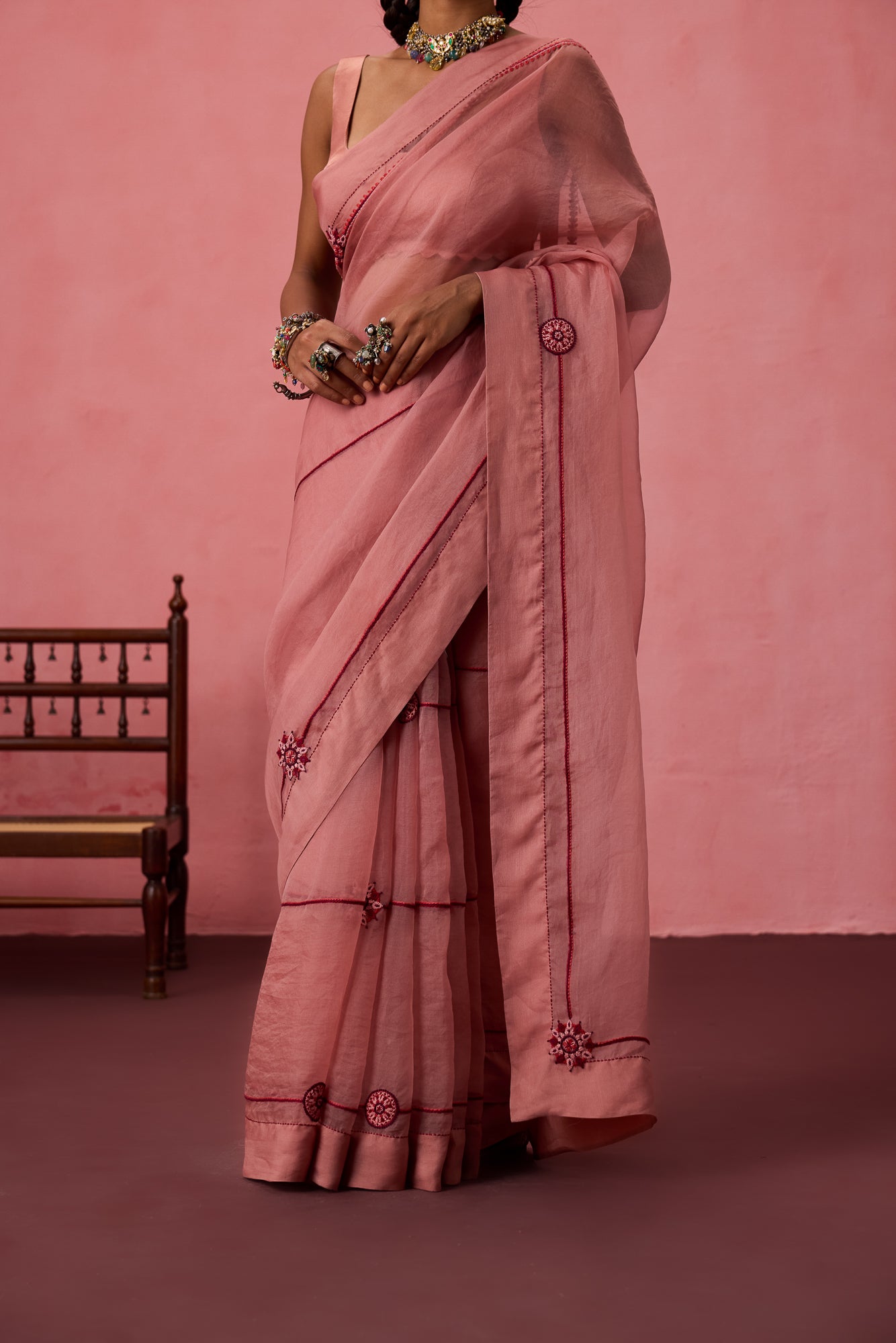 Peach organza embroidered saree comes with unstitched & unembroidered blouse fabric in chanderi