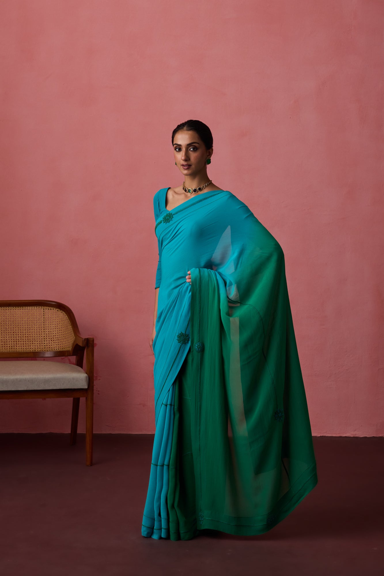 Turquoise ombre georgette embroidered saree paired with unstitched & unembroidered blouse fabric