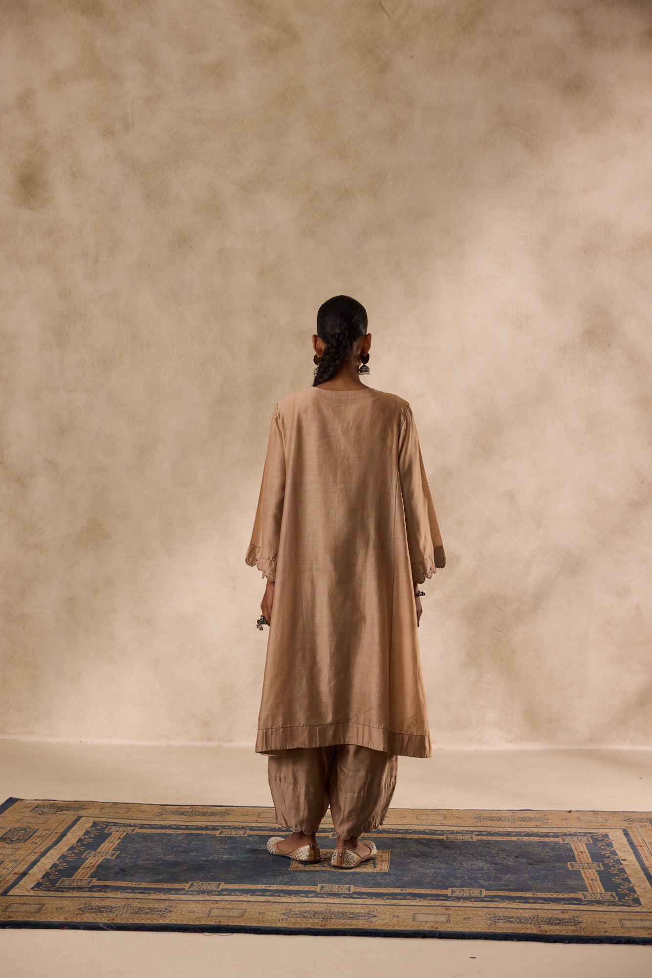 Champagne chanderi dori work  embroidered kurta paired with organic cotton slip, afgani salwar & organza dupatta