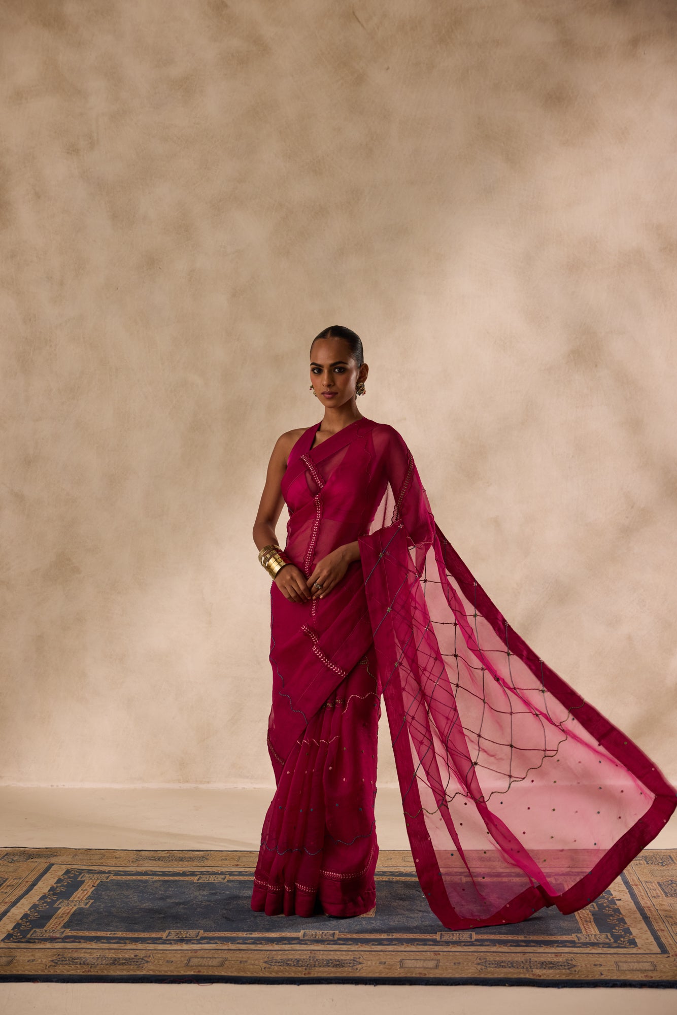 Wine organza jaal embroidred saree comes with unstitched & unembroidered blouse fabric in chanderi