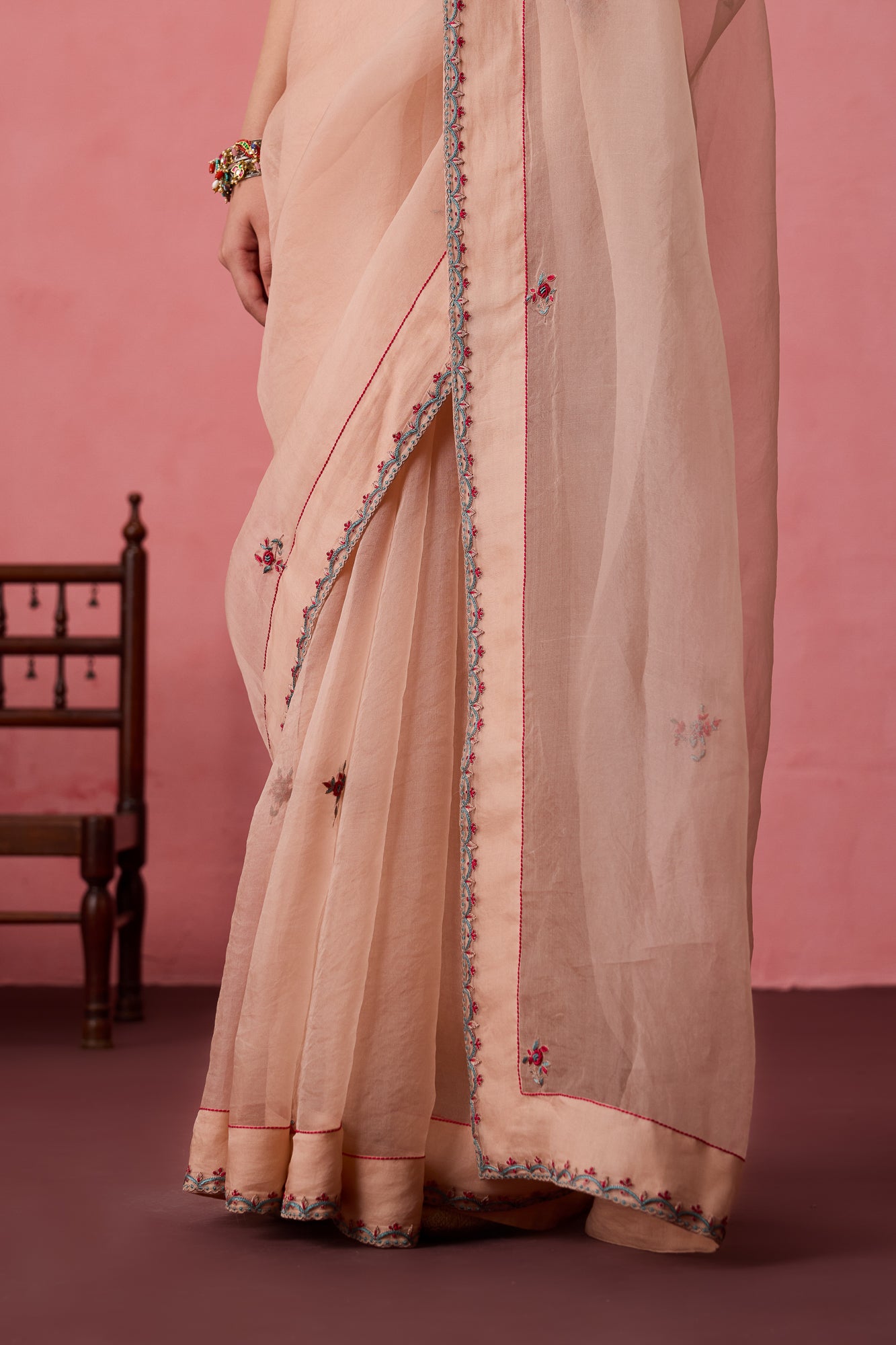 Cozy Peach organza buti embroidered saree comes with unstitched & unembroidered blouse fabric in chanderi