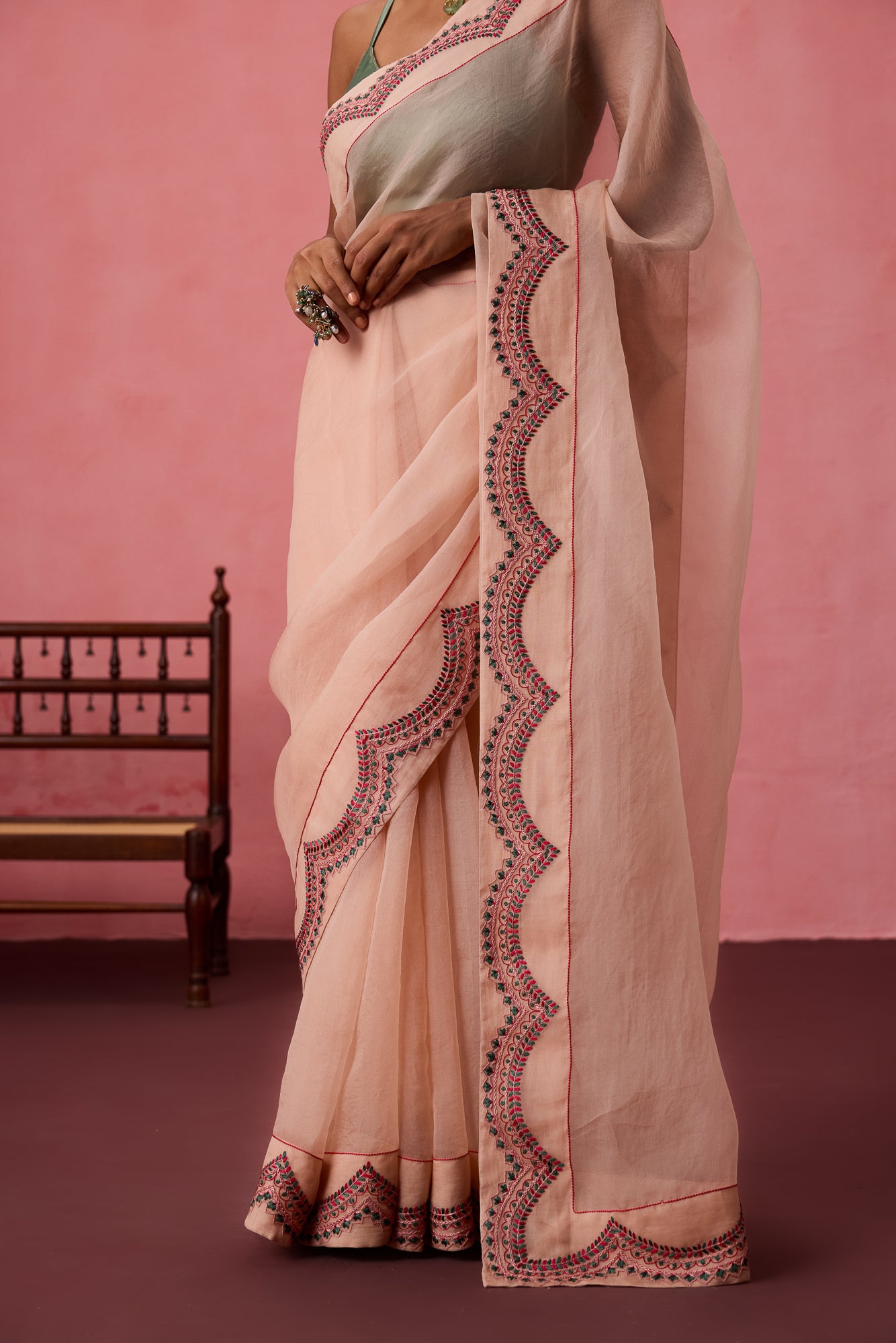 Cozy peach organza heavy scalloped border saree comes with unstitched & unembroidered blouse fabric in chanderi