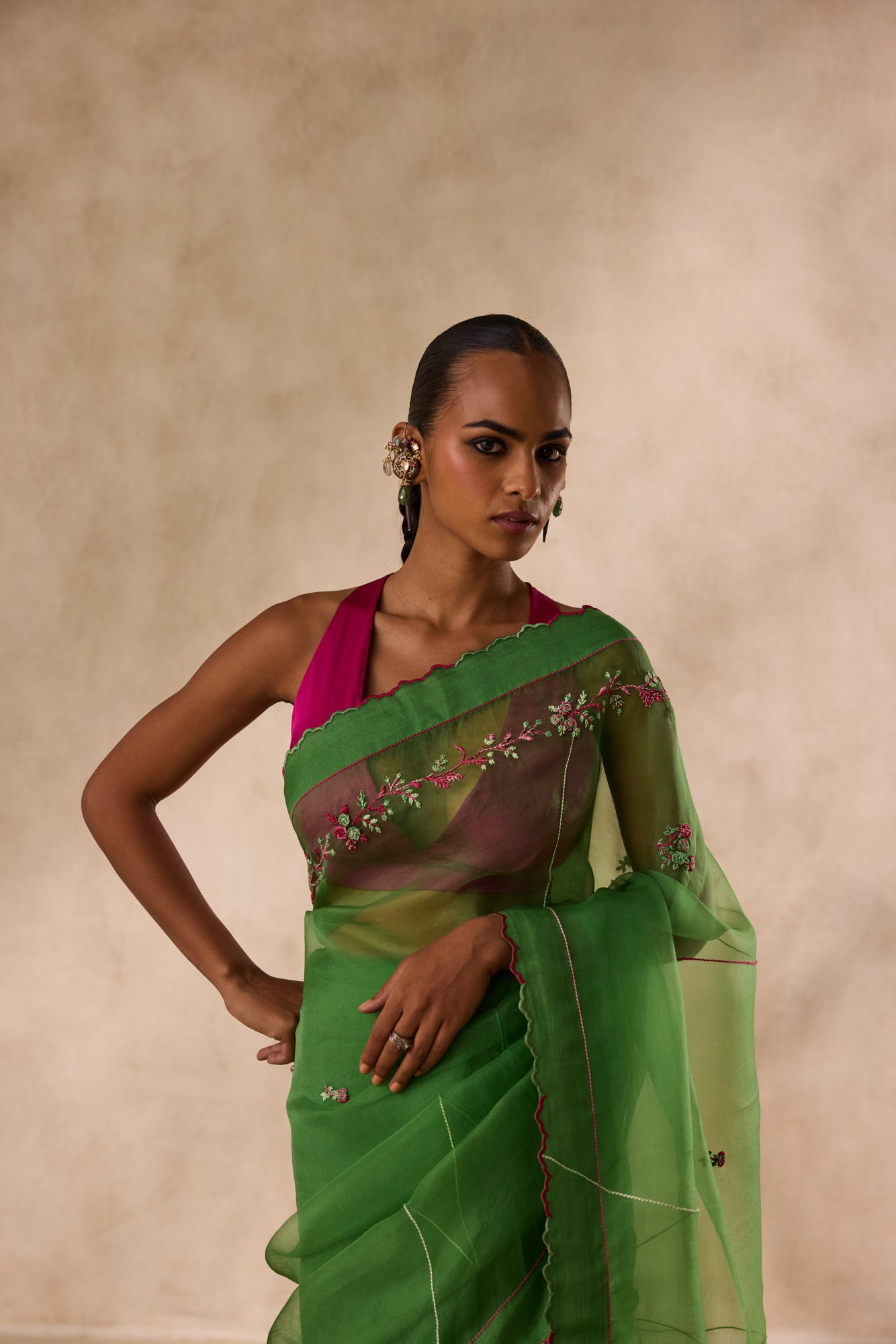 Green organza embroidered saree comes with unstitched & unembroidered blouse fabric in chanderi