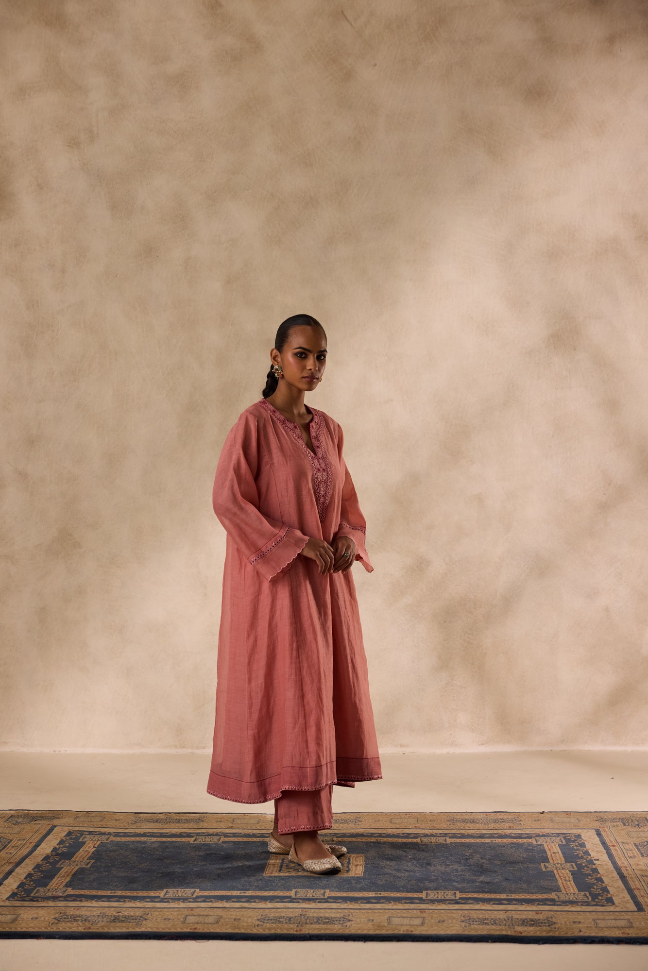 Peach chanderi heavy neckline resham embroidred kurta paired with organic cotton slip,pant & heavy border dupatta