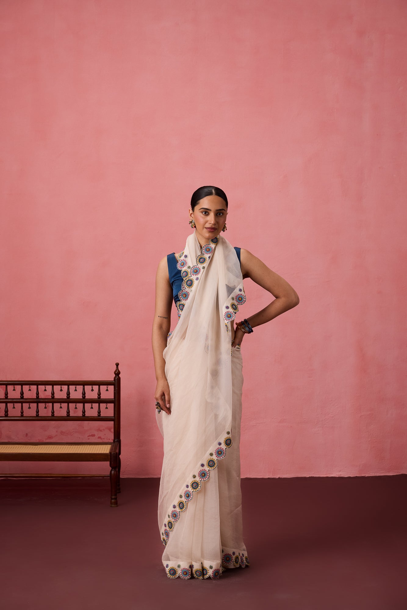 Ivory organza heavy scalloped cutwork embroidered saree comes with unstitched & unembroidered blouse fabric in chanderi