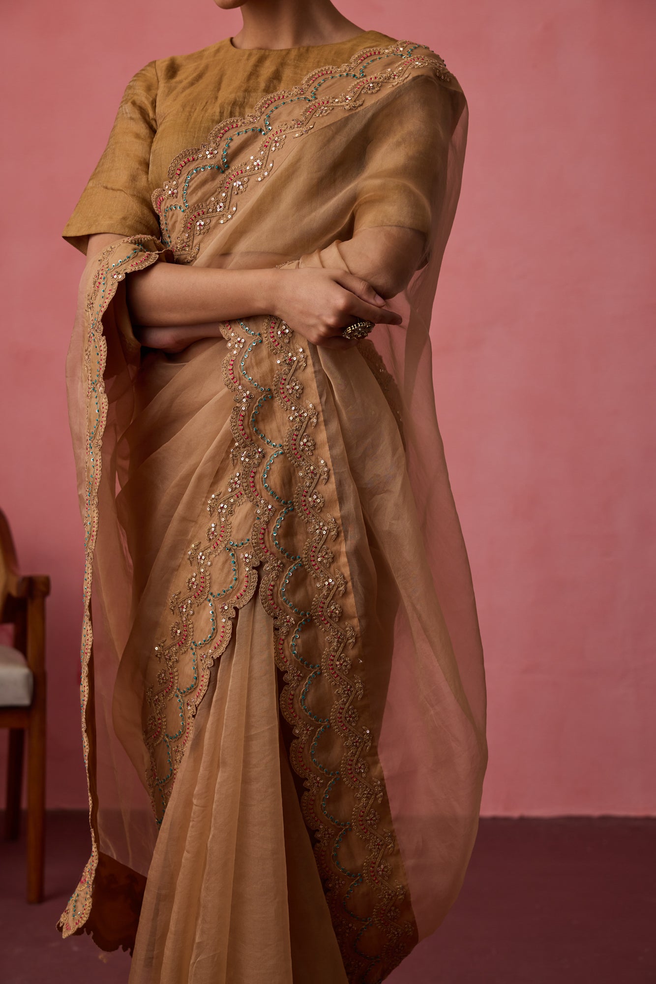 Golden organza dori & resham embroidered saree  paired with unstitched & unembroidered blouse fabric