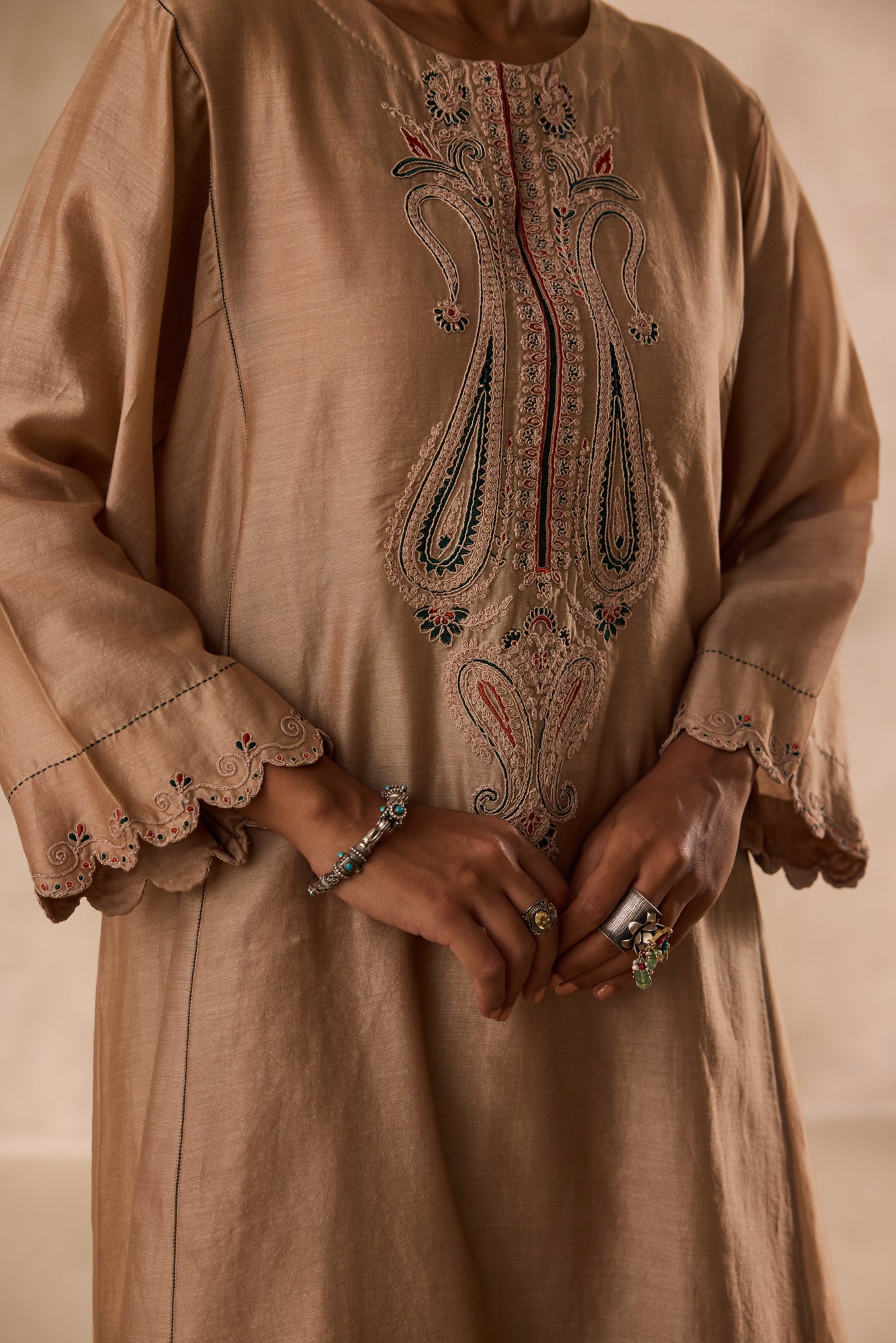 Champagne chanderi dori work  embroidered kurta paired with organic cotton slip, afgani salwar & organza dupatta