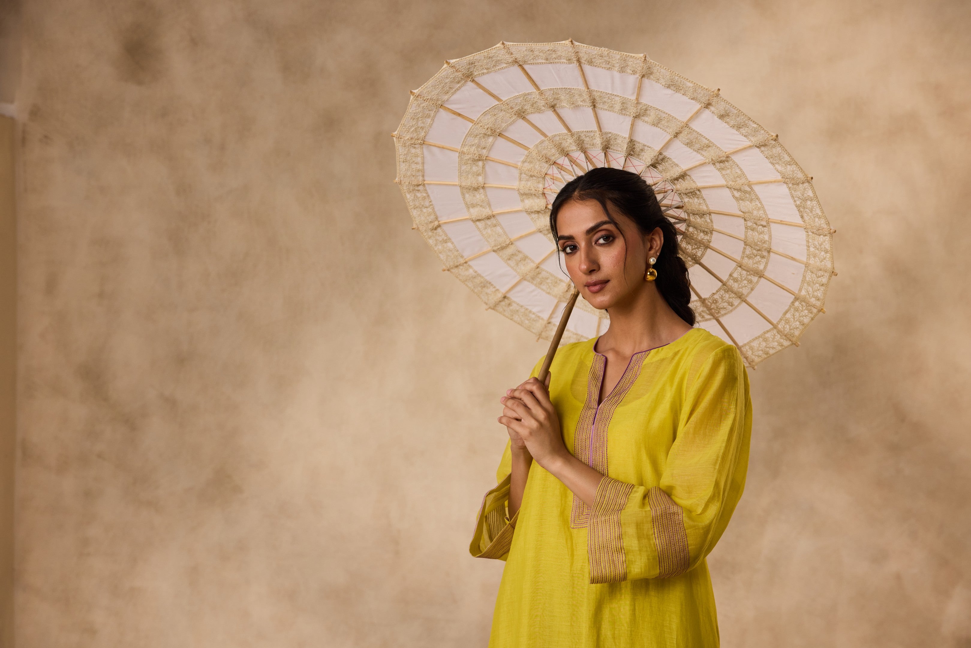 Lime yellow & Purple chanderi resham embroidered tunic paired with organic cotton slip and pant